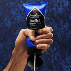 Close-up of textured particles in Jack Black Face Buff Energizing Scrub for gentle exfoliation
