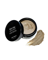 Jack Henry Premium Hair Clay jar closeup shows natural matte finish for all-day hold.