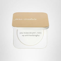 Jane Iredale Gold Refillable Compact interior shows slim design for easy powder refills on the go.