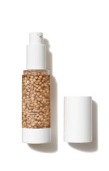 Jane Iredale HydroPure Tinted Serum bottle shows hydration and dewy finish.