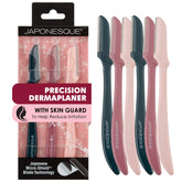 JAPONESQUE Precision Dermaplaner handle close-up shows ergonomic grip for precise facial hair removal.