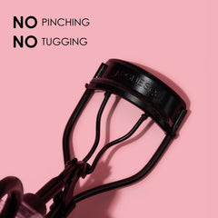 JAPONESQUE Pro Performance Lash Curler close-up cage demonstrates gentle lift without lid pressure