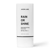 JAXON LANE Rain or Shine SPF 50 tube closeup, fragrance-free protection for sensitive skin.