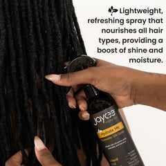 Fine-mist rosewater spray on textured hair delivering moisture