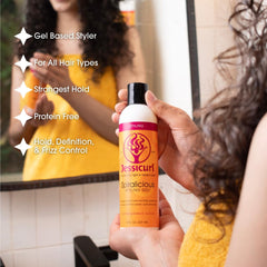 Jessicurl Spiralicious gel being applied to damp hair for curl definition.