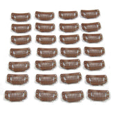 Clip metálico JFFX de 9 dientes (32 mm) para fijar extensiones con seguridad.