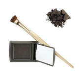Joan Rivers Beauty Great Hair Day root touch-up powder on brunette roots for fuller look.
