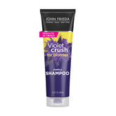 John Frieda Violet Crush Champú morado en botella para neutralizar tonos amarillos.