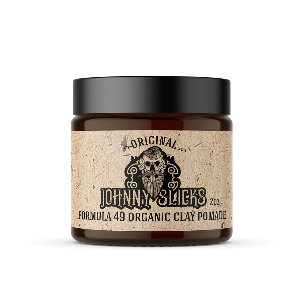 Johnny Slicks Formula 49 clay bottle front, firm hold in focus