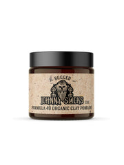 Johnny Slicks Formula 49 clay jar shows rugged matte hold and organic formula.