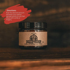 Johnny Slicks Formula 49 clay packaging showcases clean design and premium ingredients.