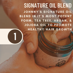 Johnny Slicks Oil Based Pomade hands applying product for even distribution.