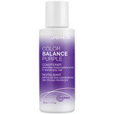 Joico Color Balance Purple Conditioner bottle demonstrates violet formula neutralizing brass on blonde and gray hair.