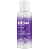 Joico Color Balance Púrpura vertiendo la botella para neutralizar tonos amarillos.
