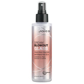 Joico Dream Blowout Glass bottle on shelf showing humidity resistance and glassy shine.