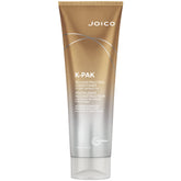 Joico K-Pak Daily Reconstructing Conditioner bottle highlighting repair and shine for damaged hair.