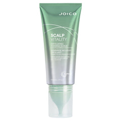 Joico Scalp Vitality exfoliating scrub bottle pump for easy application and cleansing.