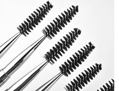 JOSALINAS mascara wand with pink cap for quick touch-ups and tidy grooming.