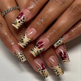 Jremg leopard print French tip nails with glossy finish for chic style