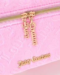 Juicy Couture durable, zippered bag designed for frequent travelers.