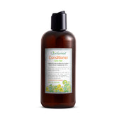 Just Nutritive gray hair conditioner bottle promoting brighter gray tones.