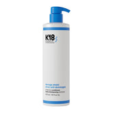 K18 Damage Shield conditioning bottle shown for daily protection and smoother hair