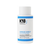 K18 Damage Shield bottle front with color-safe cleansing claim.