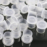 KANSPHY tattoo ink caps in 17x14mm hold pigment securely for tattooing.