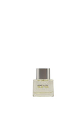 Kenneth Cole Reaction bottle front showcasing citrus notes and bold masculine design.