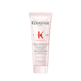 Kérastase Genesis Renforcateur bottle close-up highlights lightweight conditioning.