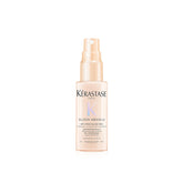 Kerastase Gloss Absolu Glaze Milk bottle delivering instant detangling and hydration.