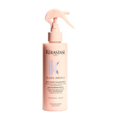 Kerastase Gloss Absolu Glaze Milk bottle demonstrates detangling for long hair.