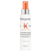 KÉRASTASE Nutritive heat protecting spray bottle shields hair from heat and adds smoothness.