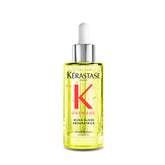 KÉRASTASE Première Repairing Gloss Oil bottle boosts shine and smoothness.