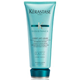 Kérastase Resistance Ciment Anti-Usure bottle ready for smoothing and strengthening hair.