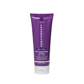 Keratherapy Daily Smoothing Cream bottle demonstrates frizz control for sleek blowouts.