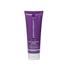 Keratherapy Daily Smoothing Cream bottle demonstrates frizz control for sleek blowouts.