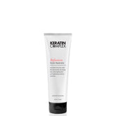 Keratin Complex Infusion Replenisher bottle front with sleek packaging and frizz-control promise