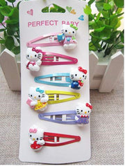 Kerr's Choice kitty hairpins sparkle with rhinestones for party moments.