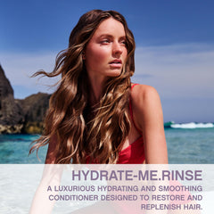 KEVIN.MURPHY Hydrate-Me.Rinse bottle pour demonstrates rapid hydration for normal to dry hair.