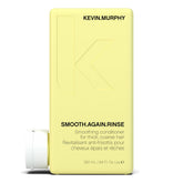 Kevin.Murphy Smooth.Again.Rinse bottle close-up showing smoothing action on thick hair