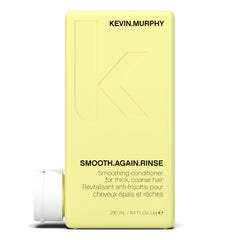 Kevin.Murphy Smooth.Again.Rinse bottle close-up showing smoothing action on thick hair