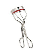 Kevyn Aucoin eyelash curler with wide opening for easy use