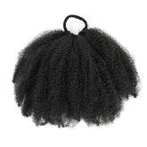 Kid's Summer Afro Puff Bun updo showcases quick protective styling and natural blend.