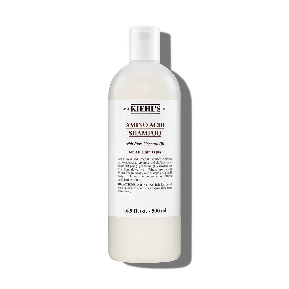 Kiehl's Amino Acid Shampoo bottle demonstrates a clarifying cleanse for light, refreshed hair.