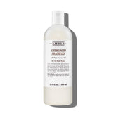 Kiehl's Amino Acid Shampoo bottle demonstrates a clarifying cleanse for light, refreshed hair.