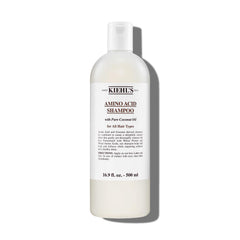 Kiehl's Amino Acid Shampoo bottle demonstrates a clarifying cleanse for light, refreshed hair.