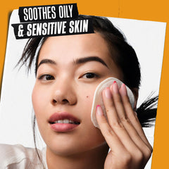 Kiehl's Calendula toner on cotton pad gently calms redness.