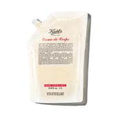 Kiehl's Creme de Corps Rich bottle pouring shows fast-absorbing hydration