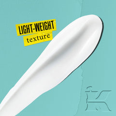 Kiehl's Expertly Clear Moisturizer on hand shows hydrating texture suitable for acne-prone skin.